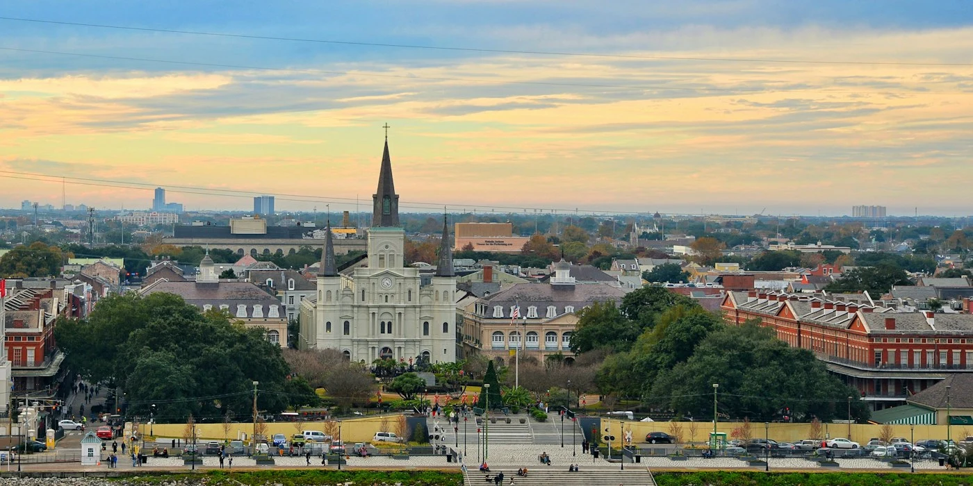 Golden-hour view of Jackson Square and St. Louis Cathedral in New Orleans